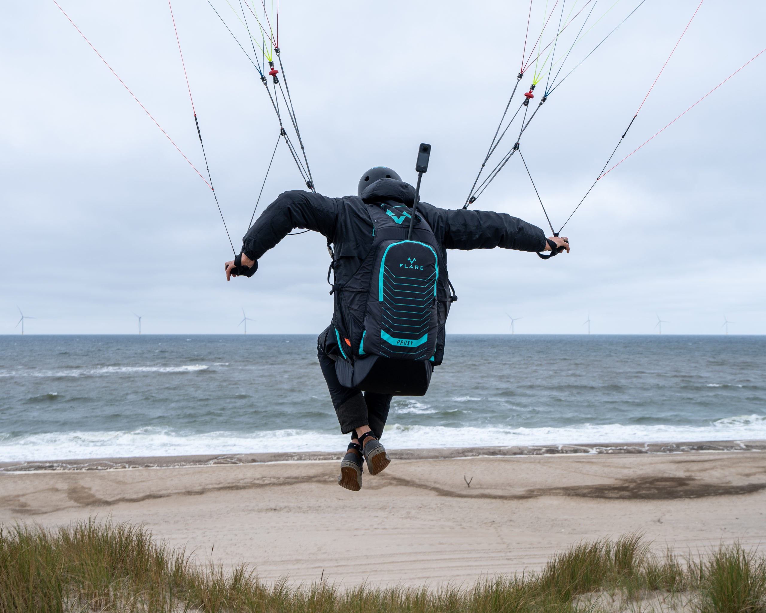 Pilote Parakite utilisant le harnais Proxy sur la dune